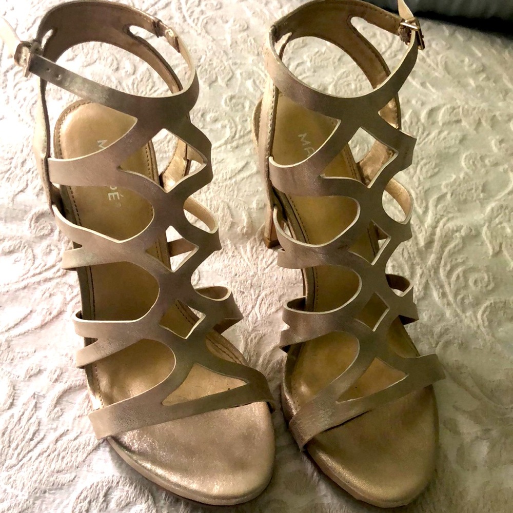 Maripe gold strappy heels.